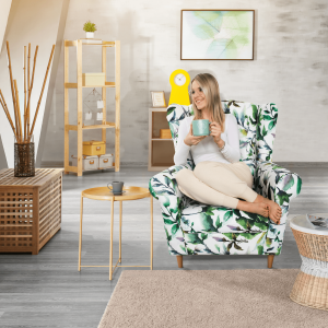 Křeslo ušák KARL, látka vzor listí - nožičky dřevěné  Místnosti MH149736W